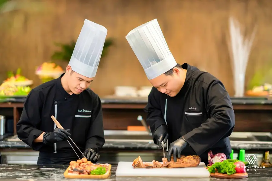 Halong Bay Day Cruise Price & Tour options 18 The chef on the Ha Long Bay cruise ship.